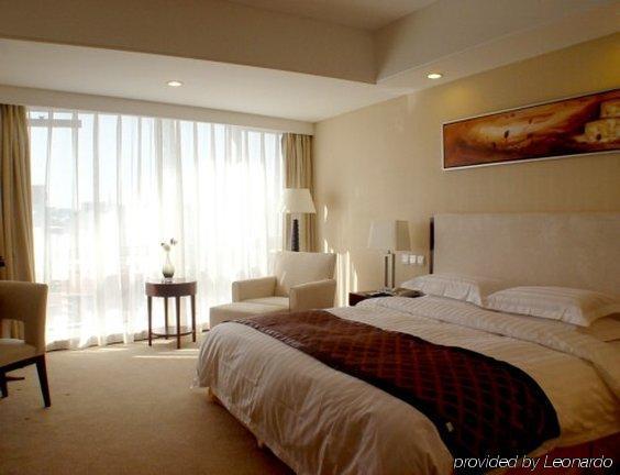 Joy City Hotel & Apartment Pequim Quarto foto